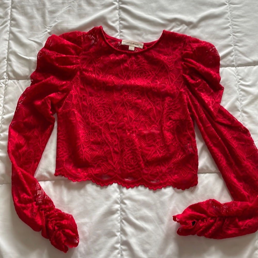 Red lace long sleeve crop top with puffed shoulders and tufted wrists